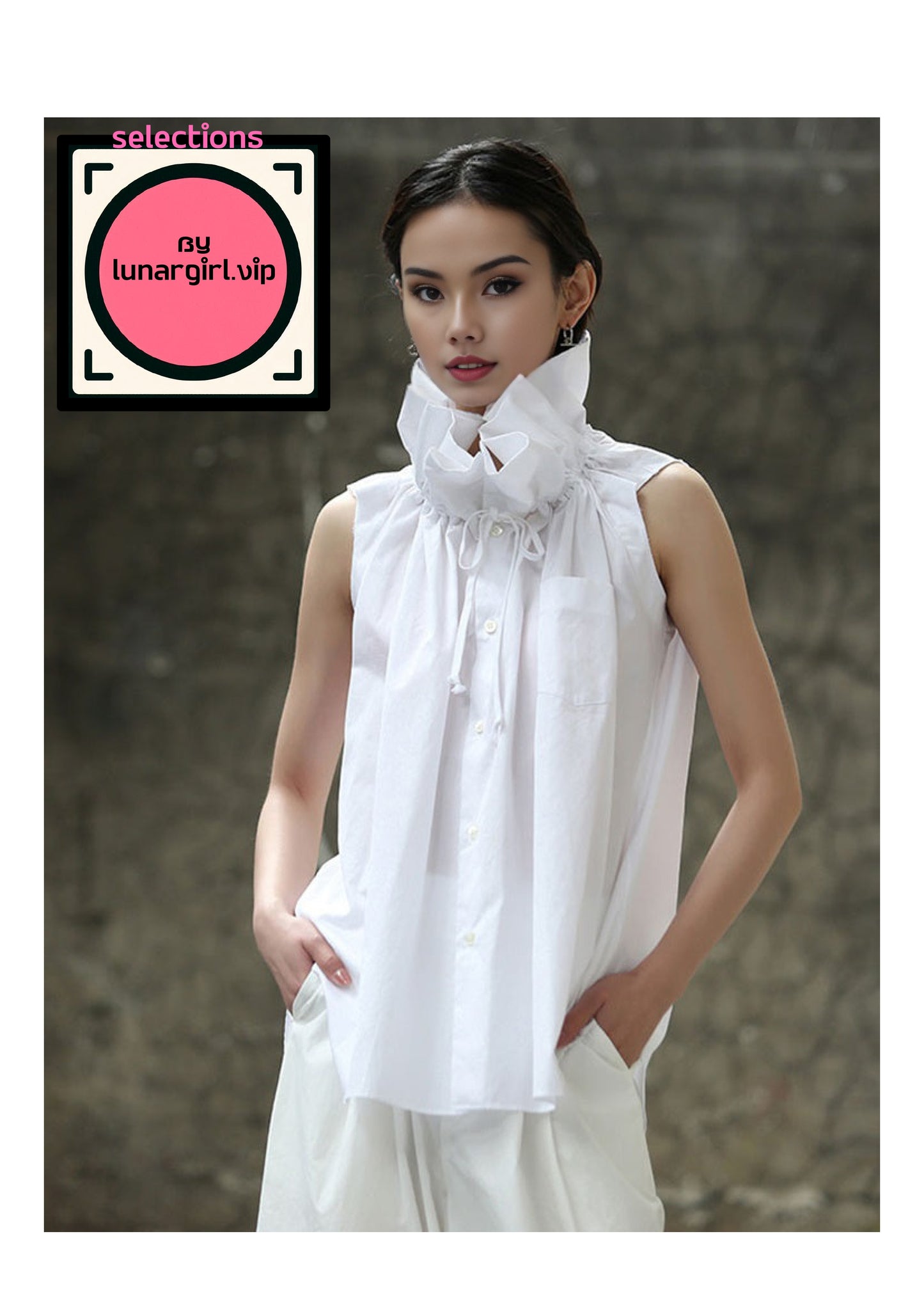 This white sleeveless shirt is sophisticated and versatile piece that oozes classic elegance with modern design elements. Featuring a high neckline adorned with ruffled detailing, it adds a touch of romantic flair reminiscent of styles often seen on celebrities spotted wearing, blending contemporary fashion with classic elements.
The sleeveless design of the shirt provides a modern and chic look, perfect for layering or wearing on its own. The armholes are cut inwards towards the chest area, giving an almos