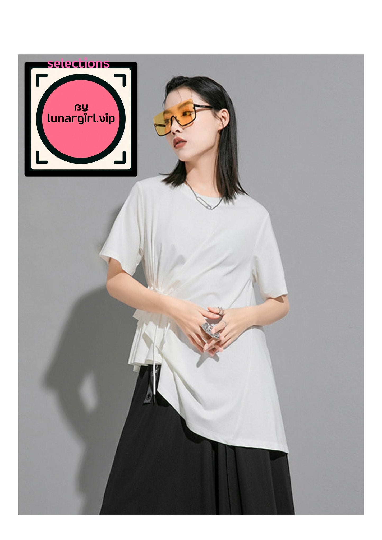 This white top features a relaxed fit with an asymmetrical hemline, adding an edgy twist to the classic white tee silhouette. It has short sleeves that are loose, enhancing the casual yet stylish vibe of the garment.

The top has a simple, round neckline that provides a clean and minimalist look. The short sleeves are loose and relaxed, contributing to the overall casual aesthetic of the top. This design ensures comfort and ease of movement, making it suitable for everyday wear.
Body and Fit: The body of th