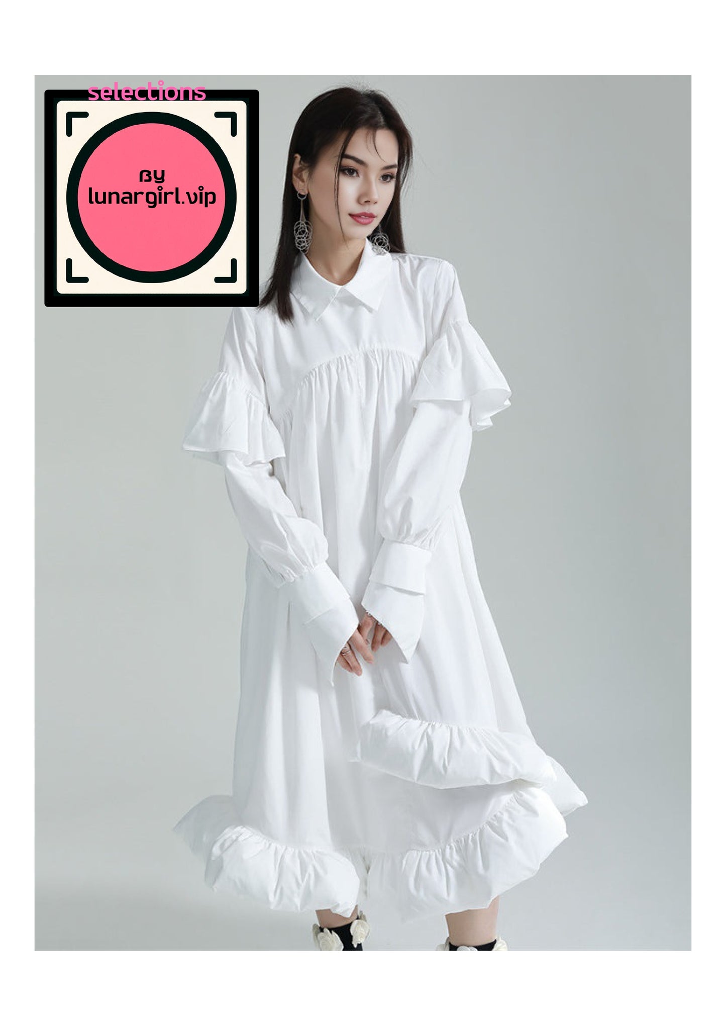 This white shirt dress that exudes both elegance and comfort. This garment is designed with a mid-calf length and a loose, flowing silhouette, making it ideal for a variety of occasions. 

This shirt dress adds a touch of Victorian elegance to the wearer and designed to frame the face beautifully.
Below the collar, there is a functional placket with buttons, which are concealed for a seamless look. This design choice maintains the dress’s clean lines and minimalist style.
The sleeves are voluminous, known a